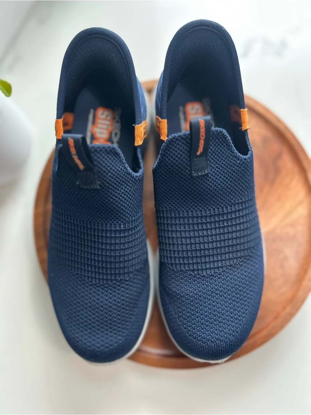 Skechers Kids Navy Slip-On Knit Sneakers with Orange Tabs